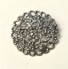 Vintage 1940's silver floral brooch Signed 835 for the silver contents and JB as a makers mark. In perfect condition for age. Possibly German maker. 5cm in diameter. Will be sent by a registered and insured post. Luxury Silver Vintage Brooches, Vintage Filigree Flower Brooches, Vintage Brooches Boylerpf Antique & Vintage Jewelry, Vintage Sterling Silver Flower Brooches, Silver Vintage Flower Brooches, German Silver, Makers Mark, Brooch Pin, Signs