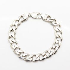 925 Sterling Silver Italy Cuban Link Bracelet 7 3/4"Weight: 36.0gWELCOME TO PAWN SHOPWe are an actual pawn shop and have been in business for over 25 years.Since 1990, our establishment has been serving a variety of clients by providing them with short term cash solutions and options of liquidity regarding their treasured heirlooms.Acknowledging that today′s customers are very sophisticated and are looking for a variety of investments, our acquisitions are hand-picked for our special clientele. Classic Sterling Silver Curb Chain Bracelet, Classic Sterling Silver Bracelet With Curb Chain, Silver Classic Cuban Link Bracelet, Classic Hallmarked Sterling Silver Bracelet, Collectible, Classic Silver Chain Bracelet For Anniversary, Classic Silver Chain Bracelets For Anniversary, Silver Cuban Link Jubilee Bracelet For Anniversary, Classic Silver Charm Bracelet For Anniversary, Dangle Cross Earrings