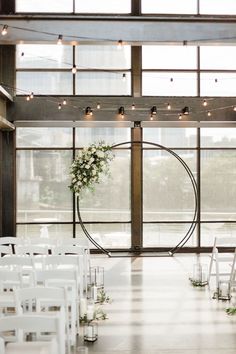 Black Circular Modern Minimalist Wedding Ceremony Arch with White Florals and Greenery Modern Minimalist Wedding Arch, Wedding Arch Industrial, Wedding Arch Ideas Modern, Minimalist Wedding Circle Table Decor, Black Wedding Ceremony Arch, Black Ceremony Arch, Black Circle Arch Wedding, Minimalist Ceremony Flowers, Minimalist Wedding Altar Outdoor