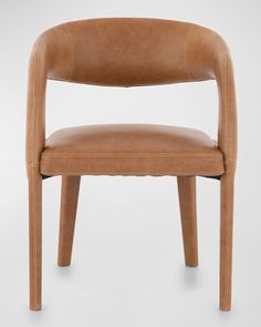 a tan leather chair with wooden legs and backrests, viewed from the front