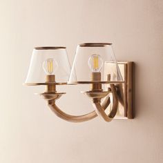 two light fixtures mounted on a wall