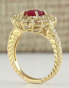 Stamped: 14K Yellow Gold Total Ring Weight: 5.2 Grams Ring Length: N/ARing Width: N/A Gemstone Weight: Total Natural Ruby Weight is 1.52 Carat (Measures: 7.90x6.10mm) Color: Red Diamond Weight: Total Natural Diamond Weight is 1.28 Carat Quantity: 34 Color: F-G, Clarity: VS2-SI1 Face Measures: 16.90x15.20 mm Sku: [703698W] Oval Yellow Gold Halo Ring Gia Certified, Exquisite Ruby Ring With 17 Jewels, Gia Certified Oval Gold Sapphire Ring, Luxury 14k Gold Gia Certified Ruby Ring, Heirloom Oval Ruby Ring Gia Certified, Fine Jewelry Gold Ruby Ring Gia Certified, Heirloom Oval Gia Certified Ruby Ring, Gia Certified Heirloom Oval Ruby Ring, Gold Gia Certified Ruby Ring