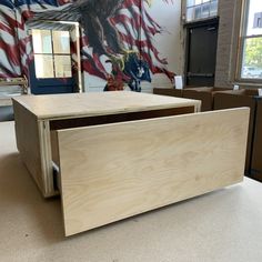 an empty wooden desk with the american flag painted on it