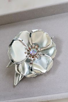 Vintage Silver Flower Brooch. Length: 2 3/8" Width: 3 1/4" Vintage condition! Loose pin. Back to the shop: https://www.etsy.com/shop/SusVintage?ref=hdr_shop_menu If you have any questions feel free to contact me. Thank you!! Silver Flower Brooch With Handmade Flowers, Handmade Flower Silver Brooches, Handmade Flower Shaped Silver Brooches, Handmade Silver Flower Brooches, Silver Flower Brooch With Floral Decoration, Silver Flower Brooch With Flower Decoration, Silver Flower Shaped Brooch With Floral Decoration, Silver Flower Brooches With Flower Decoration, Silver Flowers