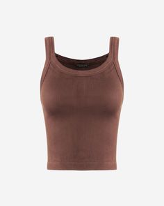 Introducing the newest addition to our basics collection, the Soho Mineral Washed Crop Tank. This tank is made from a thick and ribbed material that hugs your curves beautifully. The bodycon fit is designed to fit tight with lots of stretch, ensuring maximum comfort and flexibility. The trendy cropped fit is perfect for pairing with high-waisted bottoms or layering under your favorite sweater. Available in a variety of mineral washed colors to suit any style. Thick ribbed Bodycon (fits tight) Ul Everyday High Stretch Ribbed Tank Top, High Stretch Ribbed Tank Top For Everyday, Brown Ribbed Tank Top For Summer, Casual Ribbed High Stretch Tank Top, Basic Fitted Ribbed Tank Top, Ribbed Sleeveless Elastane Crop Top, Sleeveless Ribbed Elastane Crop Top, Trendy Ribbed Brown Tank Top, Basic Ribbed Fitted Tank Top