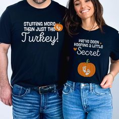 Get ready for a fun Thanksgiving surprise with these adorable pregnancy announcement shirts! Her shirt says "We've been keeping a little secret" with a cute pumpkin and baby feet graphic, while his cheeky shirt says "Stuffing more than just the turkey." Perfect for a fall maternity reveal, these cozy sweaters make your big news extra festive and memorable! Product Details: 👕 T-shirt Brands Bella + Canvas Unisex Style T-Shirt Gildan 18000 Unisex Style Sweatshirt ⏳🚚 Production & Shipping Each item is made to order and will ship within 1-5 business days through one of our printing partners. Shipping typically takes 2-5 business days after production. Please double-check your shipping address before checkout--if an item needs to be re-shipped due to an incorrect address, additional fees may Thanksgiving Pregnancy Announcement, Fall Pregnancy, Fall Pregnancy Announcement, Pregnancy Announcement Photos, Announcement Pregnancy, Fall Maternity, Pregnancy Announcement Shirt, Pregnant Couple, Style Sweatshirt