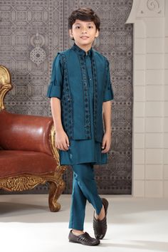 **Specifications : Please visit our brand store for more collection. StitcheryUK.etsy.com  If you need Father and Son same outfits we can make by customised for that kindly message me. Top Details Color- Teal Blue, Fabric - Soft Blended Embroidered Fabric Bottom Details Color- Teal Blue, Fabric - Blended Slik , Style - Elastic Pant Package Include :INCLUDES 1 BANDI, 1 KURTA AND 1 PANT. Turban ,Mojari And Other Accessories Are Not Sold Along With The Dress. CARE: DRY CLEAN ONLY *Additional Inform Embroidered Party Wear Kurta With Traditional Drape, Embroidered Party Wear Kurta For Festive Occasions, Eid Front Open Sets With Intricate Embroidery, Eid Front Open Sets With Resham Embroidery, Blue Suits With Dabka For Eid, Festive Front Open Sets With Chikankari Embroidery, Nehru Jacket For Eid With Traditional Drape, Nehru Jacket For Eid Party With Traditional Drape, Party Nehru Jacket For Eid With Traditional Drape