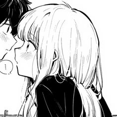 two people are kissing each other in black and white