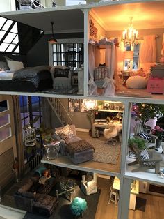 the inside of a doll house with furniture and accessories