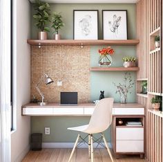 a white chair sitting in front of a desk