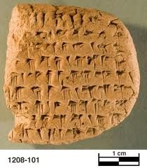 an ancient tablet with some writing on it