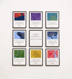 six framed maps are displayed on the wall in different colors and sizes, including red, yellow, blue, green