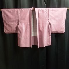 This listing is for a vintage Japanese haori (kimono jacket) that we modified slightly to allow for a roomier fit on larger frames. This Oki Haori is a soft pink with white speckling but look closely to see a series of delicately DRAWN florals. The white outlining of them are so fine that they could have been done with a single-hair brush. The petals are filled with lighter and darker shades of pink. It is a comfy synthetic - not silk - but that makes it easier to care for with a gentle wash, th Pink Kimono With Kimono Sleeves For Tea Ceremony, Pink Kimono For Tea Ceremony, Japanese Haori, Male Kimono, Wedding Kimono, Pink Petals, Womens Kimono, Fabric Bolts, Boutique Homes