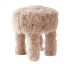 a small stool made out of sheepskins on top of a white background,