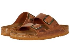 Birkenstock Arizona Soft Footbed - Leather (Unisex) - Sandals : Cognac Oiled Leather : The Birkenstock Arizona Soft Footbed slip-on sandal in oiled leather offers classic style and enhanced comfort. Birkenstock uses the term Waxy leather and Oiled leather interchangeably and may arrive marked as either. A natural variation in color can occur with oiled leathers. Raised toe bar is designed to encourage the natural gripping motion of your feet. The soft footbed features a foam layer inserted betwe Classic Brown Slip-on Footbed Sandals, Rugged Brown Sandals With Textured Footbed, Oiled Leather Open Toe Sandals With Leather Footbed, Oiled Leather Open Toe Sandals, Leather Slip-on Slides For Outdoor, Classic Leather Sandals For Outdoor, Classic Brown Slides With Round Toe, Classic Brown Round Toe Slides, Classic Brown Cushioned Footbed Sandals