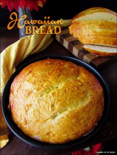 a loaf of bread sitting on top of a black plate