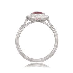 A 1.55ct ruby with deep blue saturation rests in the center of a handcrafted platinum ring. The ring showcases a halo of diamonds and openwork filigree under the gallery. ✦ WHAT COMES IN THE PACKAGE: - Diamond Engagement Ring - Quality Ring Box - Jewelry Cleaner ✦ WHY SHOP WITH US: - We've been in business for 40+ years - All of our rings are handcrafted and include high-quality natural diamonds - We offer 14-Days full refund returns - FREE insured overnight shipping (and FREE Return Shipping) - Gia Certified Oval Ruby Ring, Exquisite Oval Ruby Ring Gia Certified, Luxury Oval Diamond Ring With Lab-created Ruby, Luxury Oval Ruby Ring For Anniversary, Oval Ruby Ring With Diamond, Luxury Oval Ruby Ring With Center Stone, Luxury Ruby Ring With Oval Center Stone, Elegant Gia Certified Oval Ruby Ring, Lab-created Ruby Ring With Brilliant Cut In Oval Shape