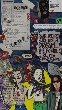 a woman standing in front of a collage with words and pictures on the wall