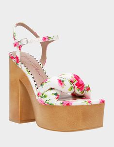 Step into this season with MANDEE floral print platform heel with a twisted toe strap. Featuring a bold and colorful floral print on the upper, these sandals will add a pop of personality to any outfit. Synthetic upper material Synthetic lining Synthetic sole 5 inch heel height 2 inch platform height Imported Wood Platform Sandals, White Sandals Heels, Floral Heels, Square Toe Sandals, Bedroom Idea, Sandal Online, Betsey Johnson Shoes, Platform Sandals Heels, Heeled Sandal