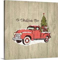 an old red truck with a christmas tree on the back