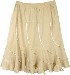 An adorable, sophisticated fashion skirt - the swingy style of this lusciously soft skirt with reflective golden angled ribbons which flow to a ruffled hemline is hard to resist. Light and flowing cotton in the form of these skirts is a welcome sight. The ribbons add a modern appeal to your summer wardrobe and you will love the fit and feel of this skirt. Pair this skirt with a solid top in any color. Bridesmaids Outfits, Soft Skirt, Short Summer Skirts, Ribbon Skirt, Sophisticated Fashion, Ribbon Skirts, Cotton Midi Skirt, Hippie Look, Beige Shorts