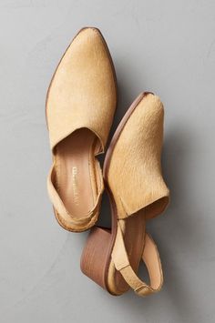 click to expand Spring Leather Slingback Pumps With Leather Footbed, Chic Brown Calf Leather Mules, Chic Suede Mules With Suede Lining, Chic Brown Suede Mules, Fall Leather Mules Medium Width, Leather Slip-on Mules With Heel Strap, Leather Mules With Heel Strap, Chic Leather Sole Mules For Fall, Chic Fall Mules With Leather Sole