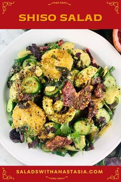 a white plate topped with cucumbers and other vegetables next to a grapefruit