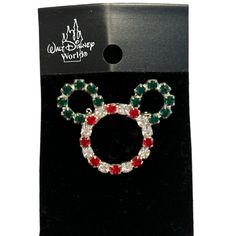 the mickey mouse ear with red, green and white beads