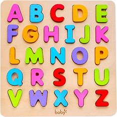 a wooden alphabet puzzle with letters and numbers