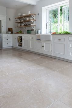 the kitchen is clean and ready for us to use in its new owner's home