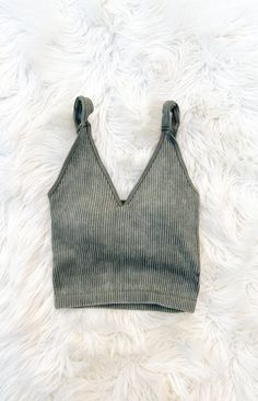 These tanks are a must have! They feature a ribbed material and removable pads. They are so easy to wear alone or under a top or sweater! And they are great all year round! 92% Nylon, 8% Spandex Runs true to size Patterns may vary Colors may vary from different viewing devices Ribbed Crop Top Tank Top For Loungewear, Trendy Seamless Crop Top For Loungewear, Knit Crop Top For Day Out In Fall, Ribbed Crop Top For Loungewear, Trendy Cropped Tank Top For Loungewear, Trendy Cropped Tank Top For Fall, Trendy Seamless Cropped Knit Top, Seamless Cropped Knit Tank Top, Chic Cropped Ribbed Tank Top