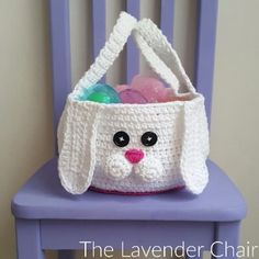 a crocheted easter basket on a purple chair