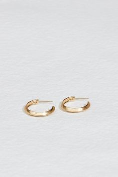 Modern Twist Yellow Gold Hoop Earrings For Everyday, Modern Twist Small Hoop Earrings, Minimalist Diamond Cut Hoop Earrings For Everyday, Classic Small Hoop Rings For Everyday, Modern Twist Hoop Jewelry With Polished Finish, Tarnish Resistant Small Hoop Huggie Earrings For Everyday Wear, Minimalist Small Hoop Diamond Cut Earrings, Everyday Huggie Hoop Earrings With Diamond Cut, Modern 14k Gold Hoop Earrings For Everyday Elegance