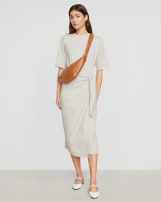 The classic t-shirt dress gets a fashion-forward update with this organic cotton, wrap-waist midi. Noa is perfect for throwing on with sneakers for an afternoon out or pairing with heeled sandals for dinner. See below for our general Size Guide and available measurements Made of 95% organic cotton and 5% spandex Machine wash cold and lay flat to dry Heeled Sandals, Style Board, T Shirt Dress, Lay Flat, Cotton T Shirt, Size Guide, Cotton Tshirt, Fashion Forward, Sandals Heels