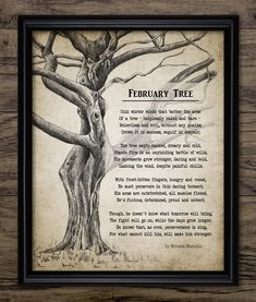 a framed poster with an old tree and poem in the frame on a wooden wall