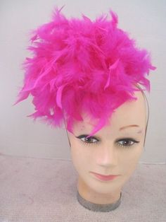 *  Flamboyant and bold this hot pink headpiece is for the confident and self assured gal who wants to look feminine, stand out in a crowd and look sophisticated. *  These feathers are fluffy and have been designed to call attention to the gal who wears it.  *  It is well balanced, secure and comfortable to wear. *  This piece can be worn on either side of the face and is designed all the way around. *  Great for picture taking and any festive occasion as you will be remembered!  Great for all De Pink Ostrich Feather Fascinator, Pink Feather Trim Headpieces For Party, Pink Headpiece, Self Assured, Ladies Luncheon, Look Sophisticated, Bird Costume, Feather Headpiece, Feather Fascinators