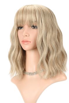 a blonde wig with bangs is shown on a mannequin head