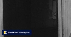 a black and white photo of a door with the words south china morning post on it