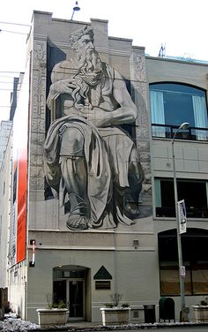 a large building with a mural on the side