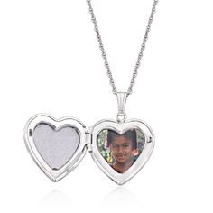 Ross-Simons - Single-Initial - Sterling Silver Heart Locket Necklace. 18". Crafted in textured and polished sterling silver, this feminine heart locket features a lovely etched design of flowers and leaves. Open to reveal your own personal 1/2" photo or keepsake. FREE engraving with a single initial of your choice in block or script type. Suspends from a rope chain. Springring clasp, sterling silver personalized heart locket necklace. Engraved Sterling Silver Locket Necklace For Mom, Sterling Silver Locket Necklace For Mom, Sterling Silver Locket Necklace Gift For Mom, Silver Heart Pendant Locket Necklace With Hallmark, Engraved Open Heart Locket Necklace, Personalized Silver Heart Cut Locket Necklace, Silver Heart Pendant Locket Necklace With Polished Finish, Personalized White Gold Open Heart Locket Necklace, Personalized Silver Locket Necklace For Valentine's Day