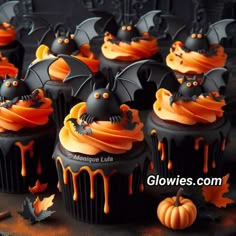 halloween cupcakes with bats and orange icing