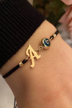 ✨Evil Eye Personalized Letter Bracelet 14K Solid Gold / Real Gold Letter Bracelet / Best Gift for Girls / Evil Eye Bracelet Gift for Her ✨ Material: Solid Gold (Not Gold Filled or Gold Plated) Karat: 14K (real gold stamp 585) Gold Color: Yellow Gold Gold Adjustable Evil Eye Bracelet, Adjustable Gold Evil Eye Bracelet, Adjustable Gold Evil Eye Symbolic Bracelet, Gold 14k Charm Bracelet Gift, 14k Gold Charm Bracelet Gift, Symbolic Yellow Gold Bracelets With Charms, Symbolic Yellow Gold Bracelet With Charms, 14k Gold Charm Bracelet For Gift, Adjustable Gold Charm Bracelet With Initials