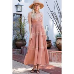 Featured In A Forever Classic Halter Neck Silhouette With Embroidery Throughout The Dress. Smocking At The Waistline For Comfy And Added Shape. Effortless Pull-On Style Maxi Dress. Very Feminine Silhouette. Bohemian And Romantic Style Perfect For A Casual Summer Day Or Your Next Vacation! - Relaxed Fit - Halter Tie Back Neck - Smocked Waist - Feminine Flowly Silhouette - Embroidery - Maxi Dress - Fully Lined Material: 100% Cotton Sizes Marked And Fit: Small: 2-4 Medium: 6-8 Large: 10-12 Our Bout Floral Embroidered Smocked Dress For Summer Garden Party, Summer Smocked Dress With Floral Embroidery For Garden Party, Summer Floral Embroidered Smocked Dress For Garden Party, Embroidered Smocked Dress For Spring, Spring Floral Embroidered Smocked Dress, Bohemian Spring Dresses With Tonal Embroidery, Bohemian Summer Dress With Tonal Embroidery, Summer Bohemian Embroidered Dress With Tonal Embroidery, Shift Dresses Work