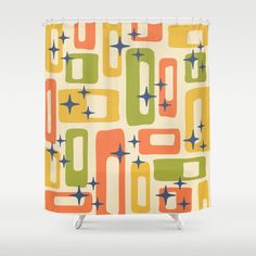 a colorful shower curtain with stars on it