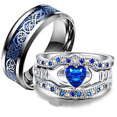 an image of two wedding rings with blue and white stones on them, one in the middle