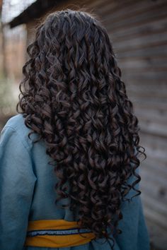 Wig Type: Lace Front Lace Type: High-quality Swiss lace Color: Dark brown Length: Approximately 23"-27" long Style: Long, curly Parting: No set part Heat Resistance: Up to 300°F Hair Density/Thickness: 150% Cap Size: Approx. 23" head sizes best Internal Structure: Metal combs + elastic for custom fit Series: Natural Plus Please click here for all the details about our Swiss lace Natural Plus Series lace front wigs, including info on sizing, inner construction, and hair density. **Explore our ful Long Brown Curly Hair Natural, Dark Brown Hair Curly Natural, Dark Brown Hair Curly, Long Dark Brown Curly Hair Natural, Big Brown Curly Hair, Long Brown Curly Hair Extensions, Dark Brown Curly Hair, Brown Hair Curly, Chocolate Brown Curly Wig