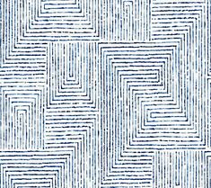 an abstract blue and white pattern with lines on it's surface, as well as the