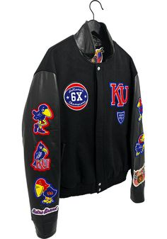 Add a layer to your gameday look with this Kansas Jayhawks Black Jeff Hamilton Basketball Leather Heavyweight Jacket! Stay warm in cooler weather as you cheer on the Jayhawks in this great Winter Coat. With a embroidered team graphics on chest, back, and sleeves, you'll be the most comfortably warm and stylish while at the game. Two front pockets, Rib-knit collar, cuffs and waistband, Full Snap, Vegan leather, Jeff Hamilton design, Embroidered graphics, Imported Black Team Spirit Outerwear For College, Black Team Spirit Outerwear For Sports Events, Black Outerwear For Game Day, Casual Black Outerwear For Game Day, Team Spirit Black Outerwear For Streetwear, Black Team Spirit Outerwear For Streetwear, Black Casual Varsity Jacket For Game Day, Casual Black Varsity Jacket For Game Day, Black Outerwear For Sports Events