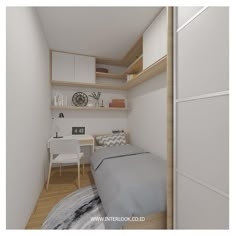 a small bedroom with a bed, desk and shelves on the wall next to it