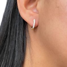 Diamonds Huggie 14k Gold Earrings Mini Our Round diamond Huggies are the perfect earrings for everyday wear. They add a subtle sparkle to any outfit! 14k yellow gold, 14 round brilliant-cut pavé diamonds 0.30 cts total weight Size: 1.75mm / 14 stones total please contact us at: info@sabrinaa.com or call us (626)384-7162 for more information INTERNATIONAL CUSTOMERS ARE RESPONSIBLE FOR ALL DUTIES, TAXES AND FEES ASSOCIATED WITH CUSTOMS. THESE ARE SEPARATE AND NOT INCLUDED WITH YOUR PURCHASE. IT IS Elegant White Huggie Earrings With Diamond Accents, Dainty White Diamond Earrings With Vvs Clarity, Elegant White Huggie Earrings With Single Cut Diamonds, Elegant White Huggie Earrings With Diamonds, Elegant Hypoallergenic Diamond White Huggie Earrings, Delicate Diamond White Earrings With Accents, Elegant White Diamond Huggie Earrings, Elegant White Cubic Zirconia Huggie Earrings, Elegant Hypoallergenic Huggie Earrings In Diamond White